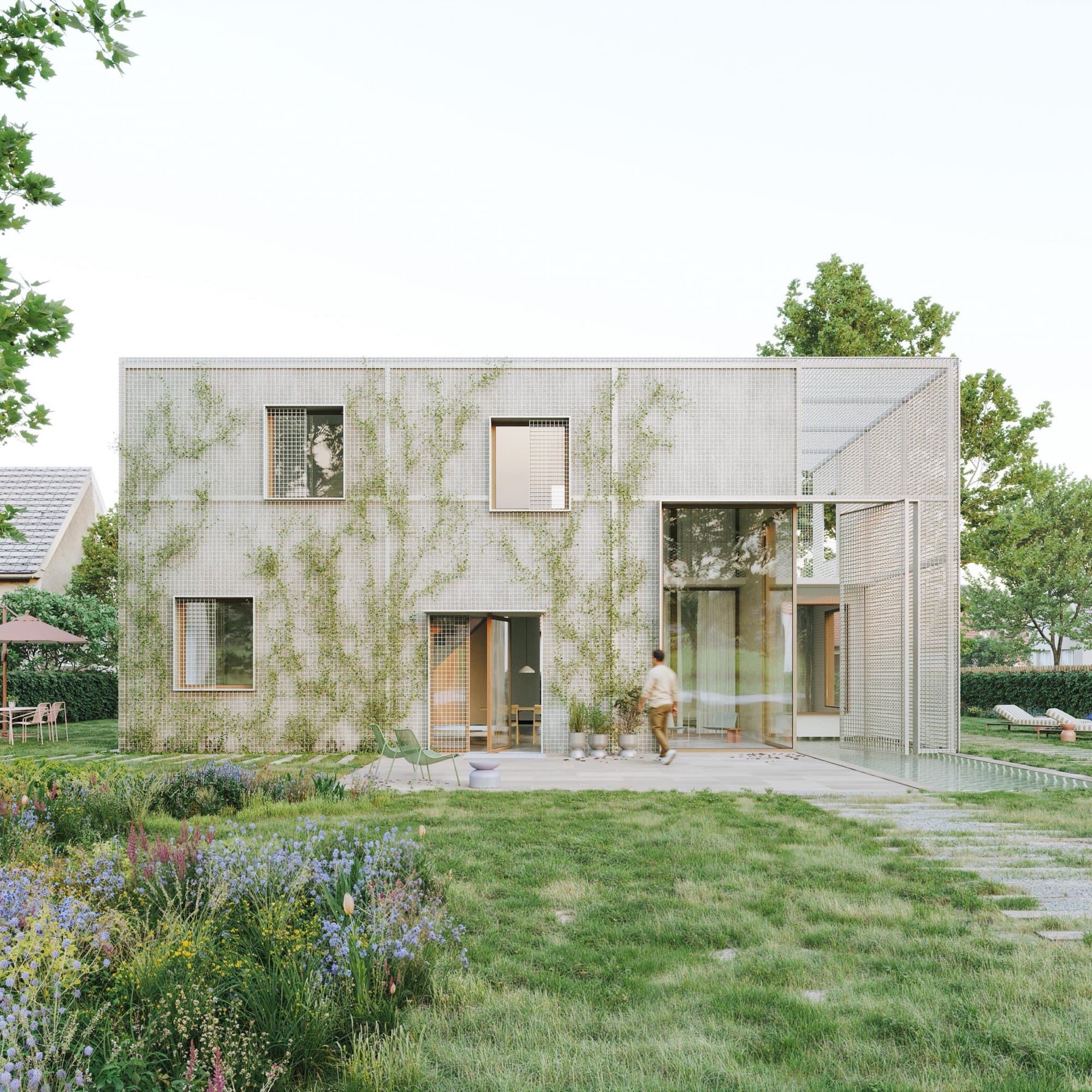 Haus M41 – offener Wohn- und Essbereich mit Blick in die Natur